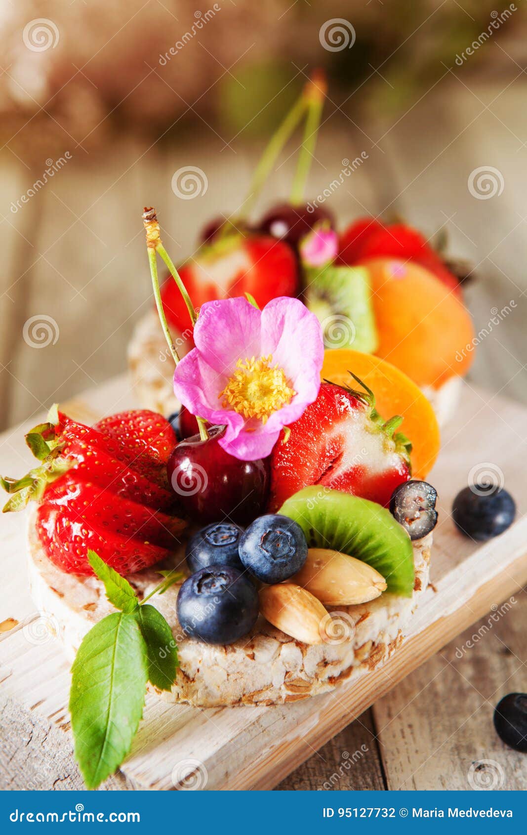 Multigrain Rice Cakes with Berries, Fruit and Almond for Healthy Stock
