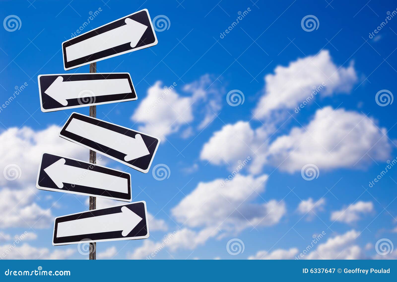 multiple directions signs on blue sky