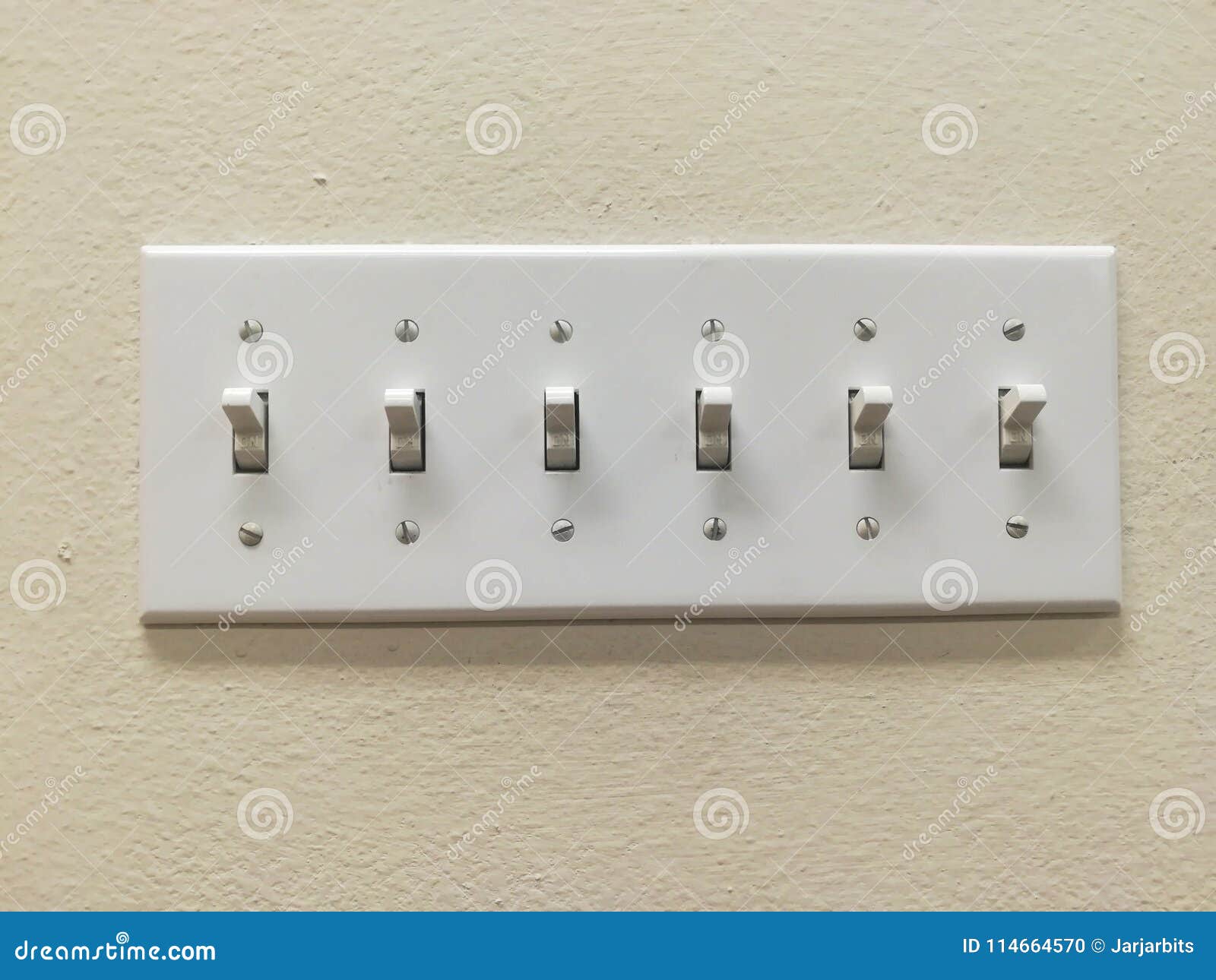multiple light switches grouped together