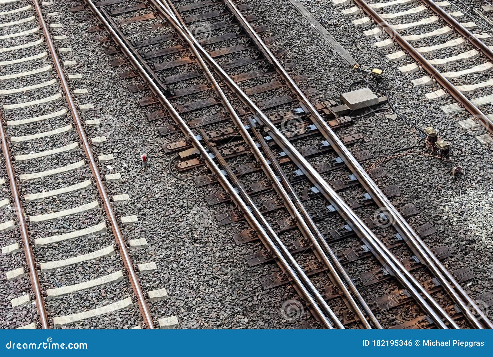 Multiple Railroad Tracks with Junctions at a Railway Station in a