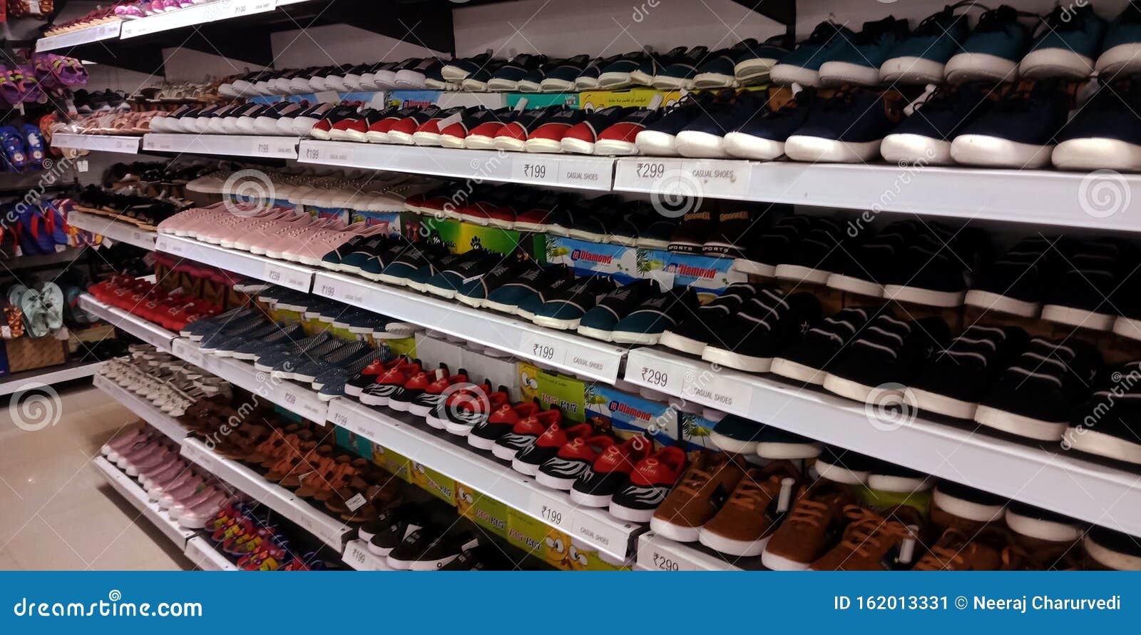 Multiple Variety of Footwear Shoes Arrange on Showcase at Store ...