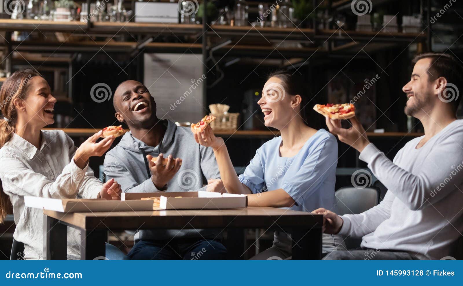 Multiracial Friends Laughing Eating Pizza Gathered