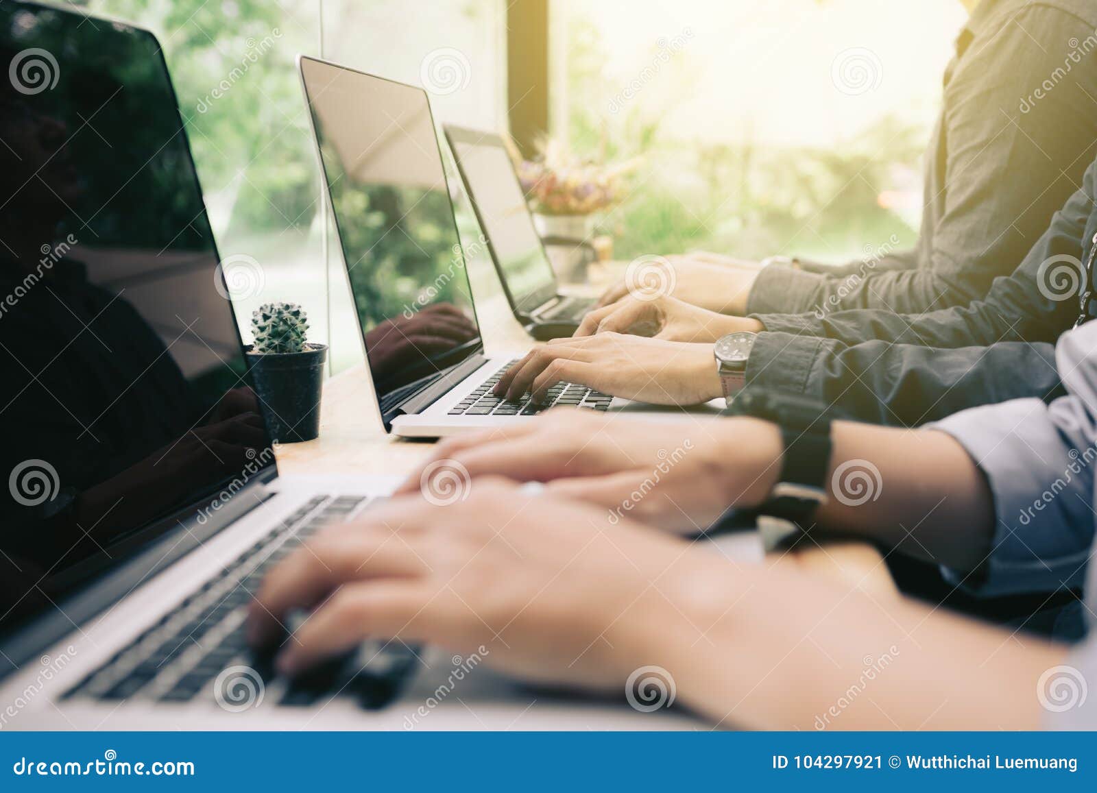 Multiracial Group of Students Coding on Laptop at Coworking Space in