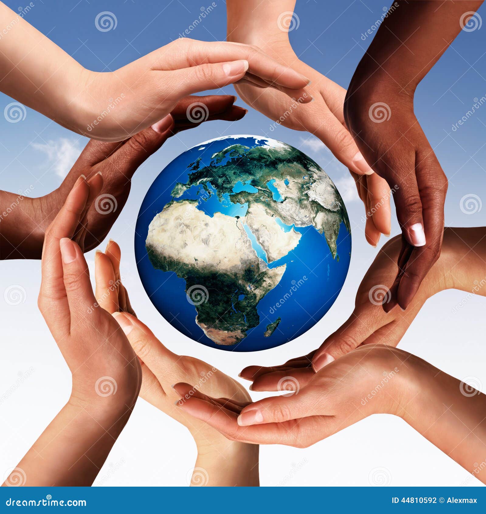 multiracial hands making a circle together around the world glob