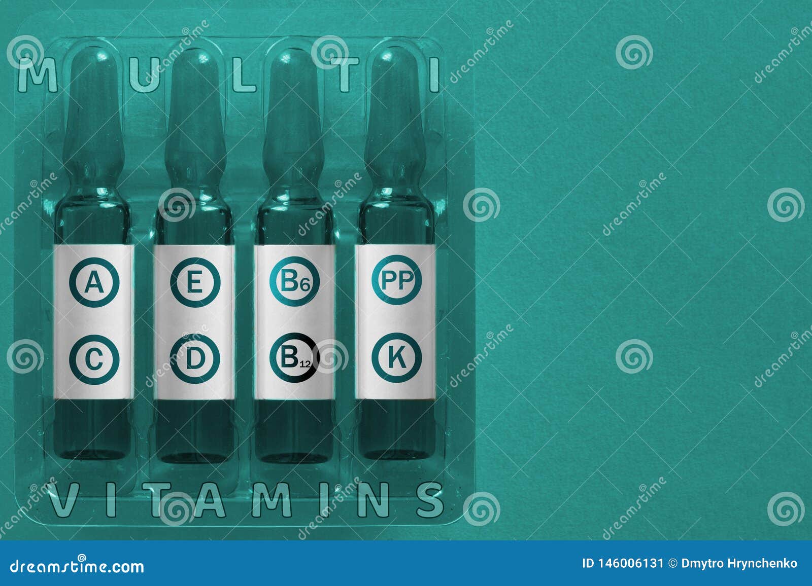 multivitamins using concept. four ampules with overlay letters of inscription a c e d k pp b6 b12 vitamin s