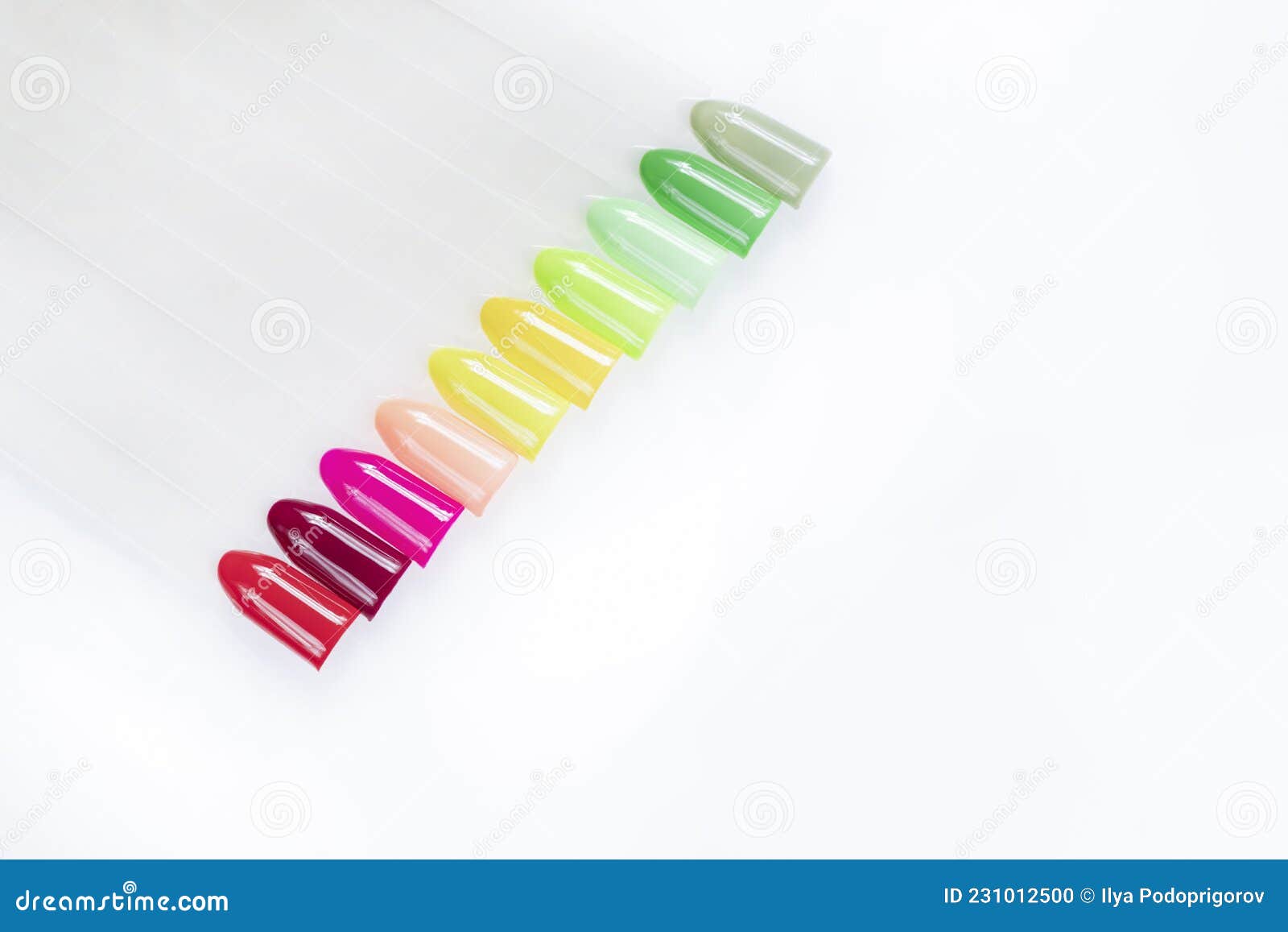 MultiÑ olor Nail Tips on a White Background. Examples of Manicure for