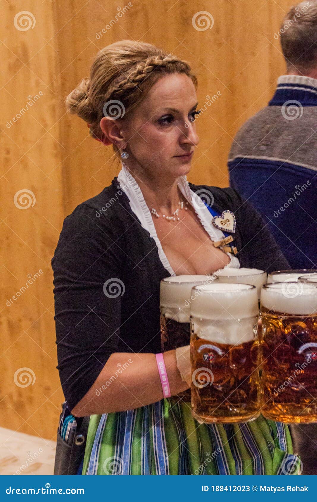 MUNICH, GERMANY - SEPTEMBER 17, 2016: Waitress Carrying Many Beer ...