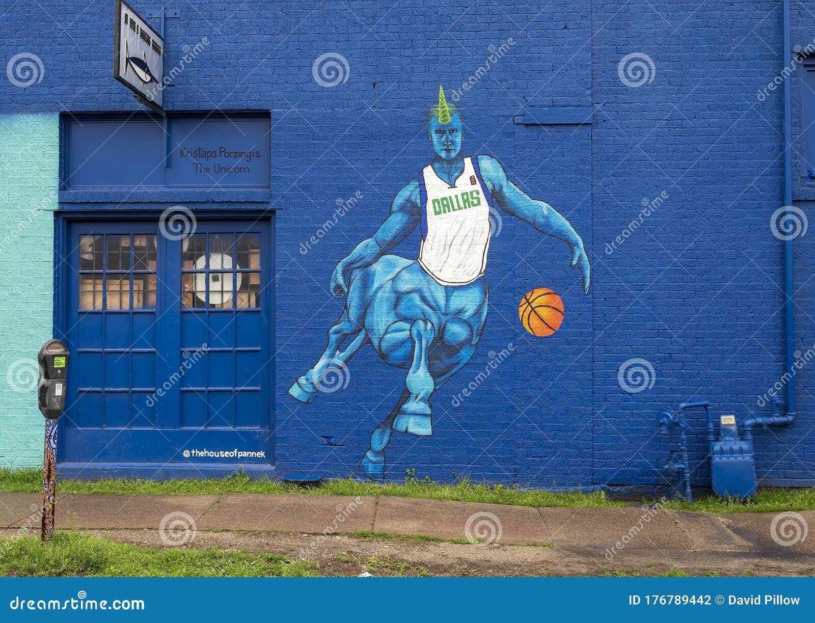 mural in deep ellum featuring dallas mavericks basketball star kristaps porzingis, nicknamed the unicorn.