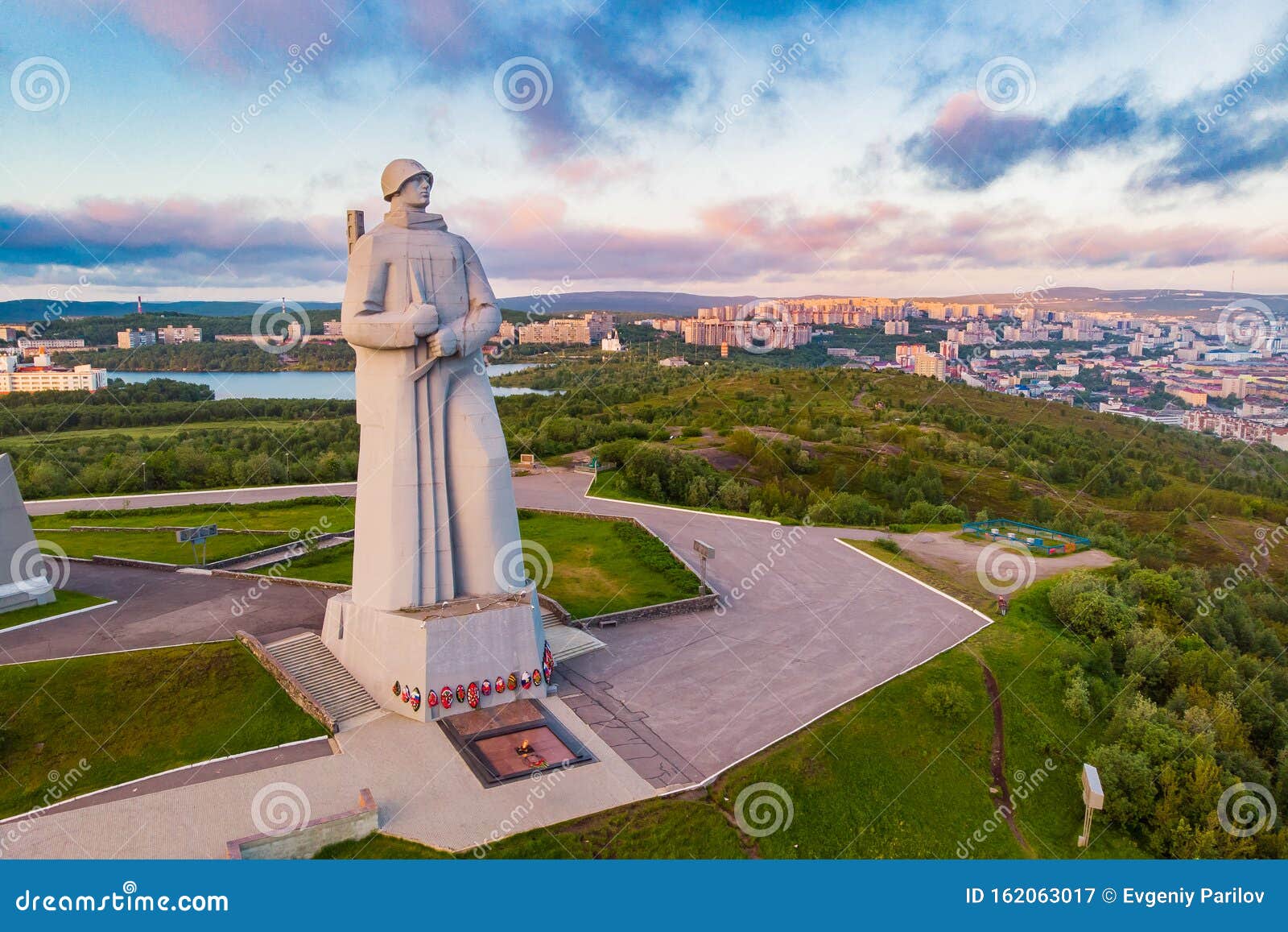 murmansk, russia - july 1, 2019: aerial view panorama of city monument defenders of soviet arctic alyosha