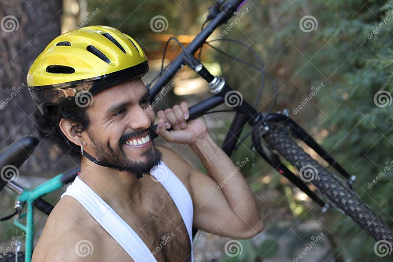 Muscular Cyclist Holding Mountain Bike on His Shoulder Stock Photo ...