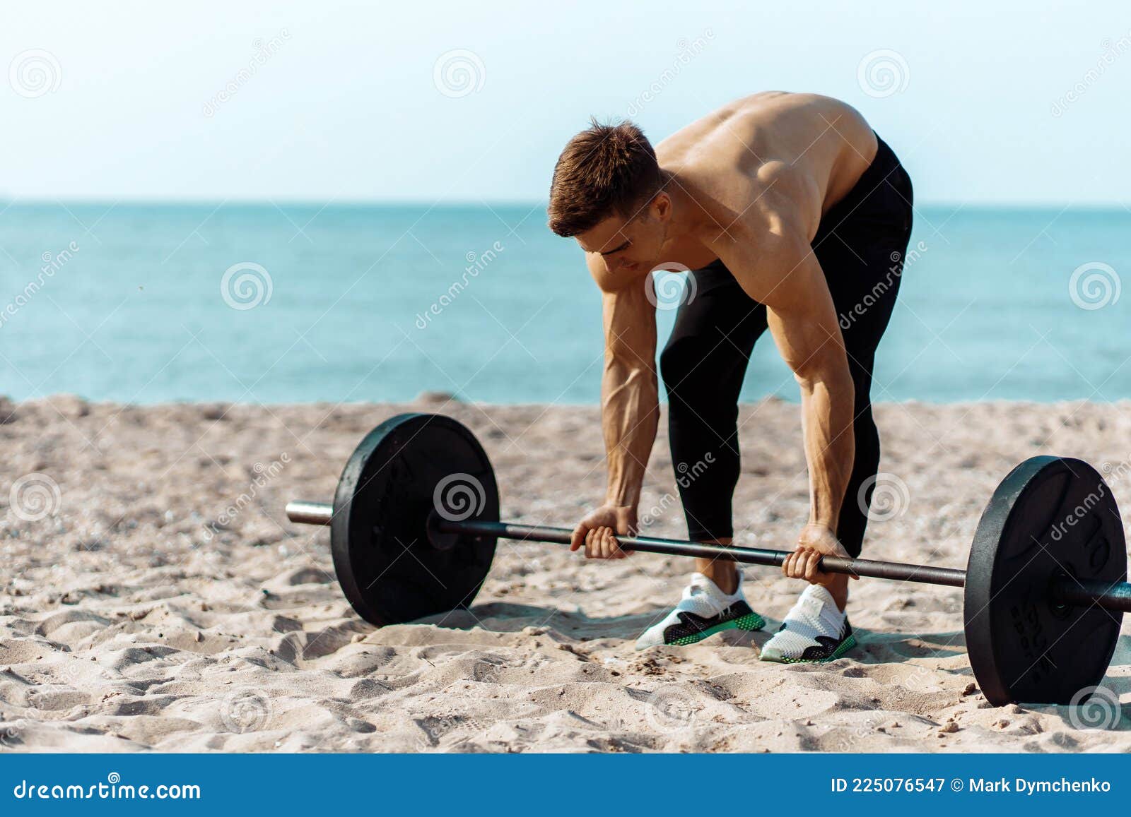 A Strong Girl With Big Muscular Arms On A Beach Stock Photo, Picture and  Royalty Free Image. Image 18043673.