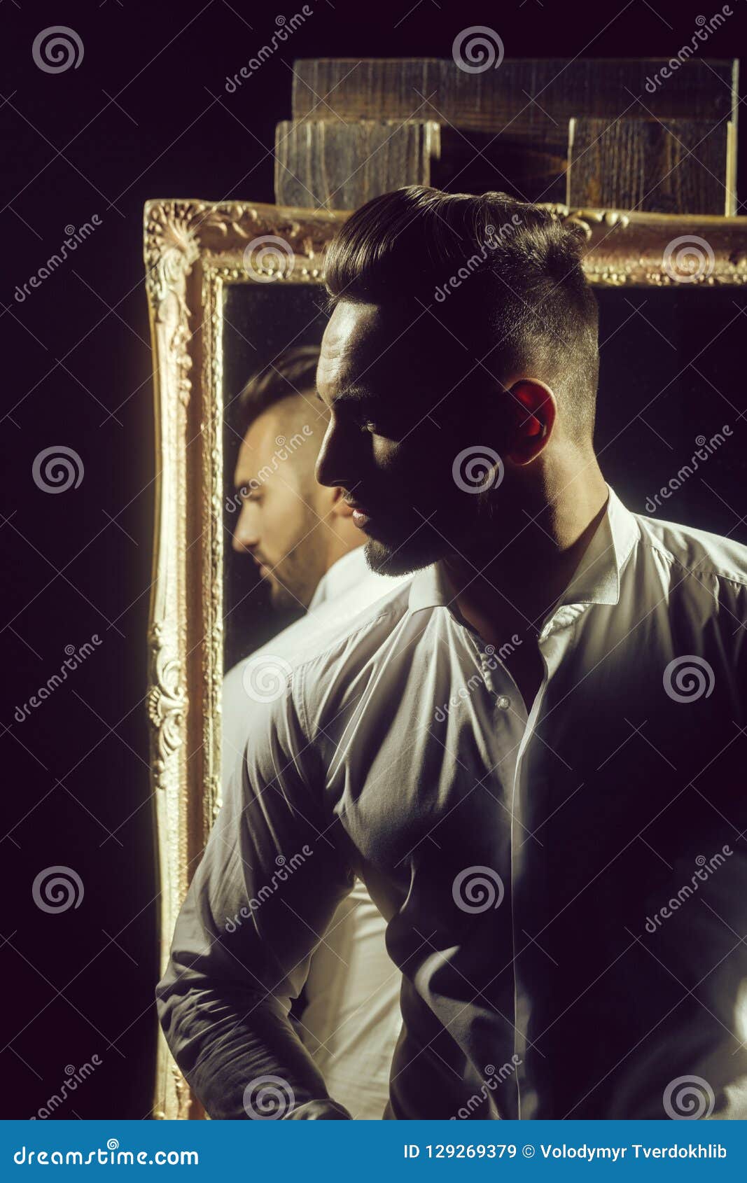 Muscular Macho Man with Athlete Body Near Vintage Mirror Stock Image ...