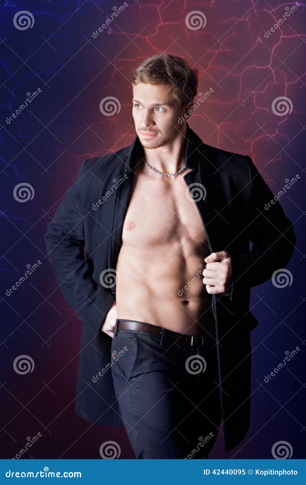 Muscular man in a coat. stock image. Image of beautiful 42440095