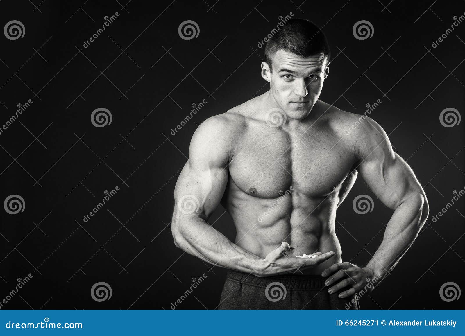 Muscular Man on a Dark Background Stock Image - Image of dark, fitness ...