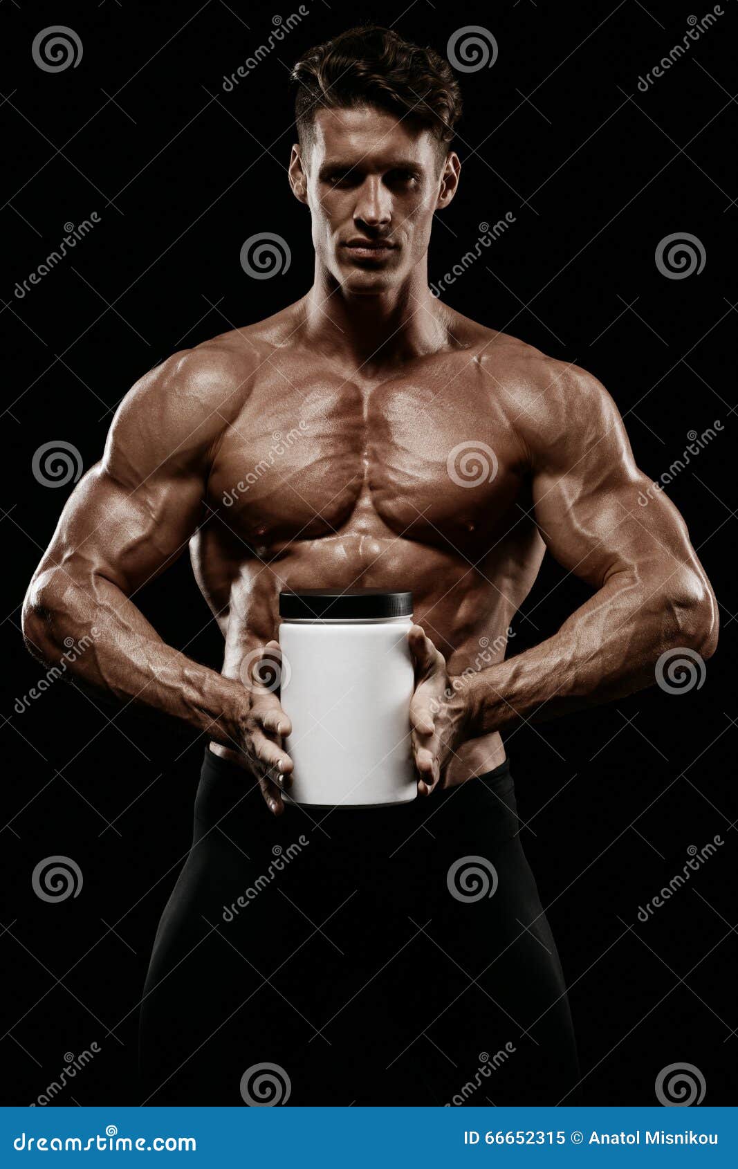 Muscular Man Holding Jar with Protein Stock Image Image of power