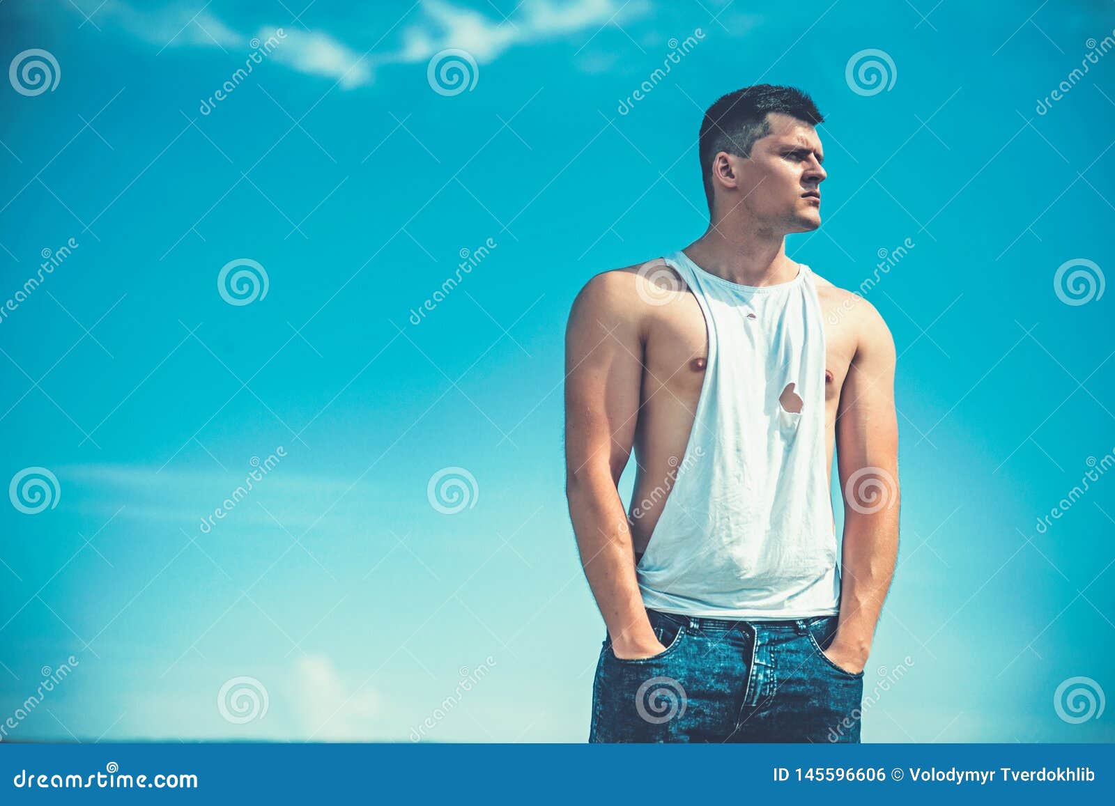 Muscular Man with Muscle Torso Sunny Day on Blue Sky Background, Summer ...