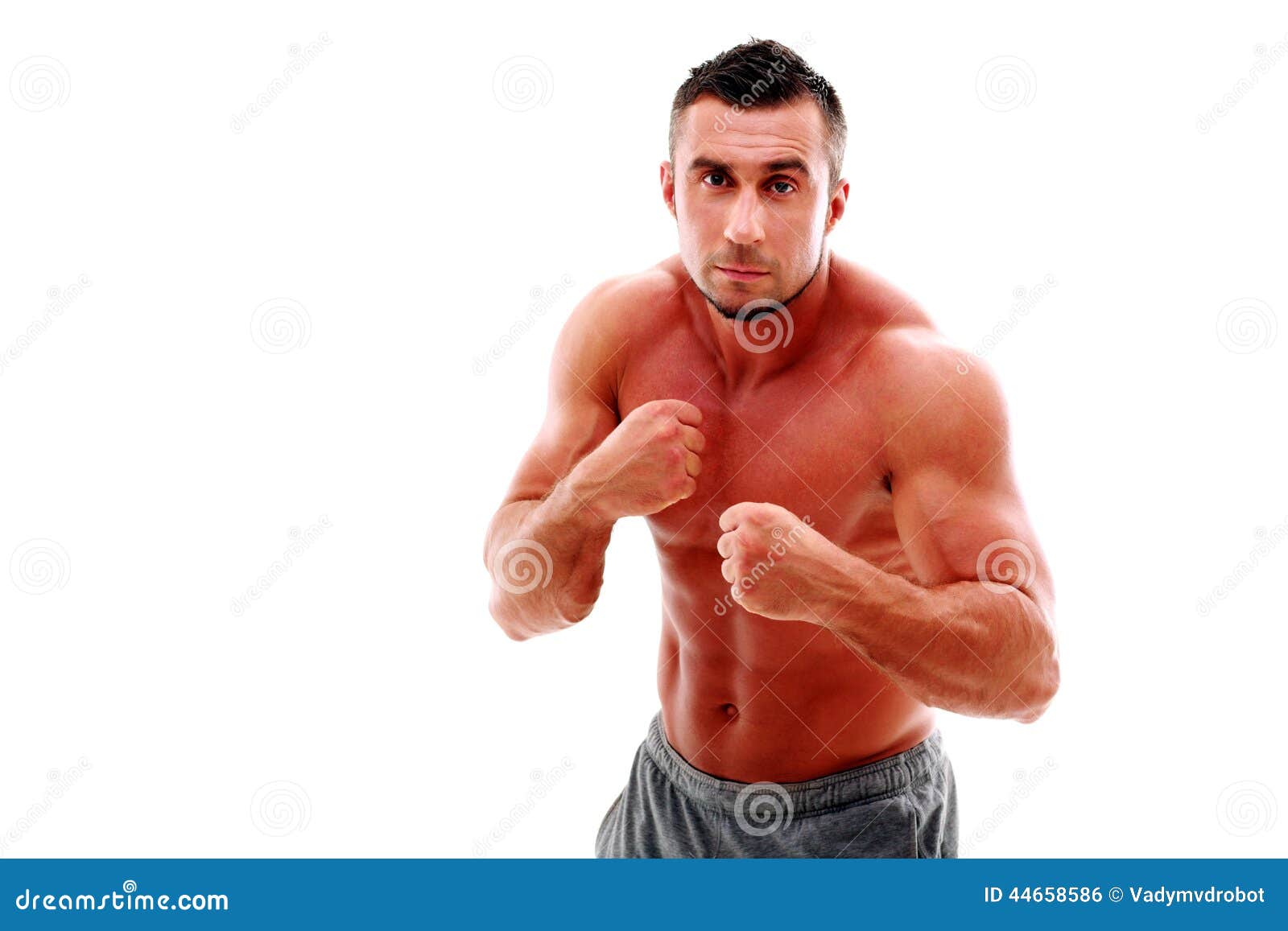 muscular-man-preparing-fight-portrait-over-white-background-44658586.jpg