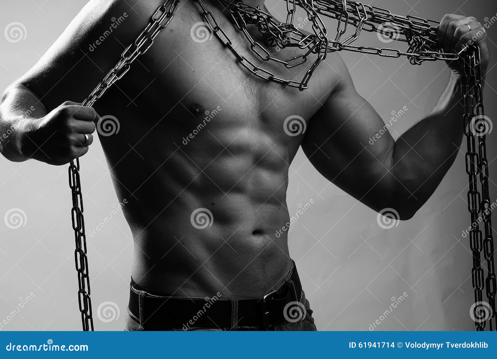 Muscular man with rope stock photo pic