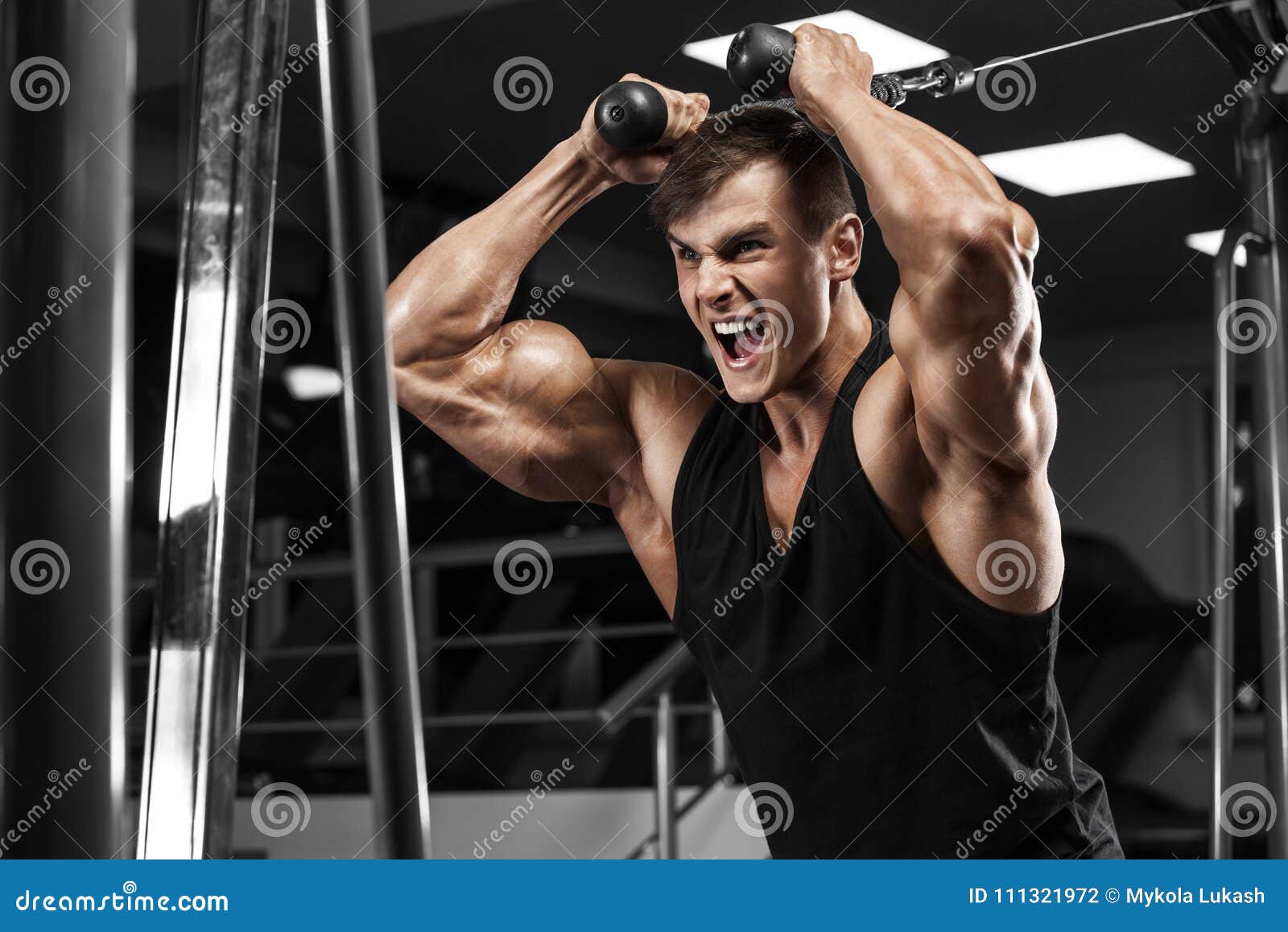 Muscular Man Working Out in Gym, Bodybuilder Strong Male Stock Photo