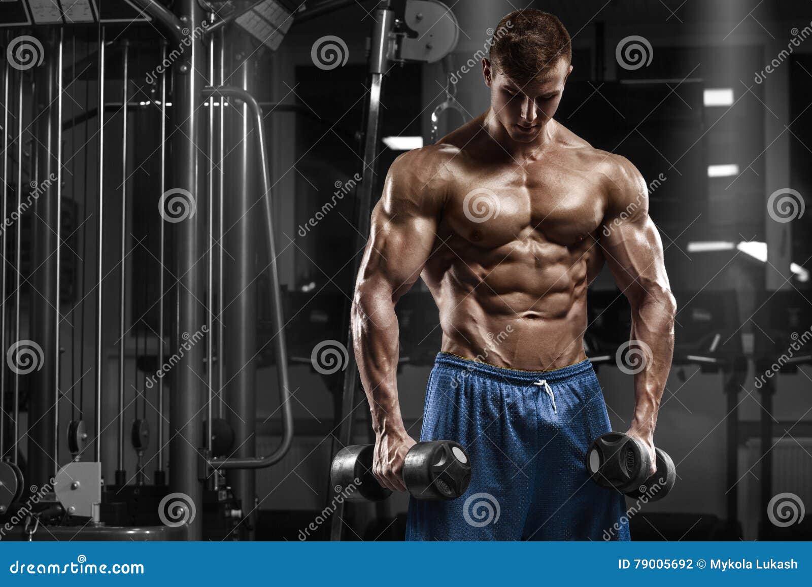 Muscular Man Workout In Gym. Strong Male Naked Torso Abs 