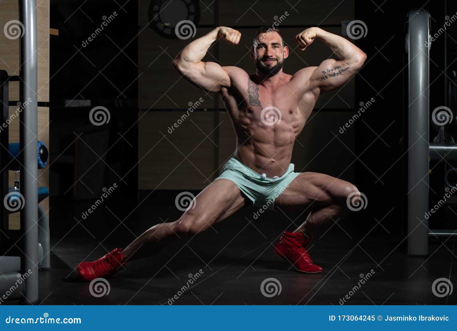 Muscular Men Is Hitting Rear Double Bicep Pose Stock Image Image Of Male Building 173064245