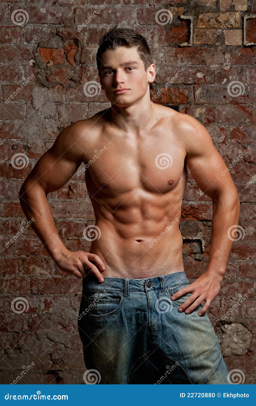 Muscular Young Guy Posing In Jeans And Naked Torso Stock 