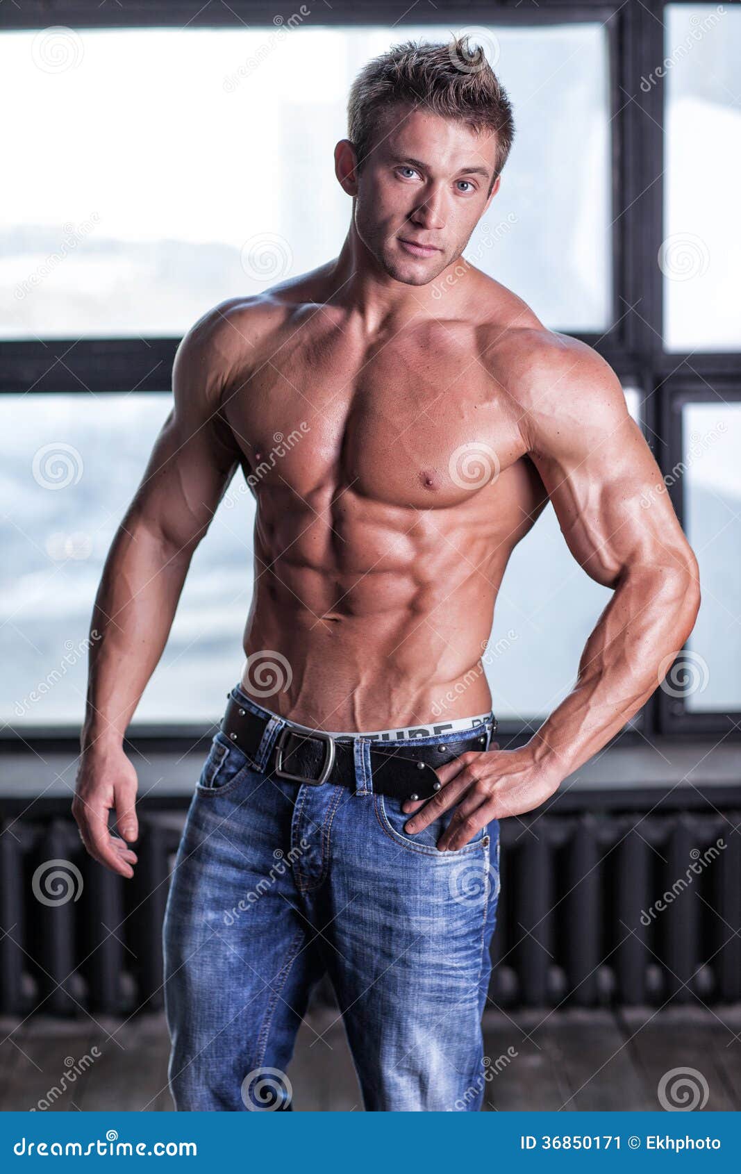 Muscle Naked Young Man Posing In Jeans Stock Photo - Image 