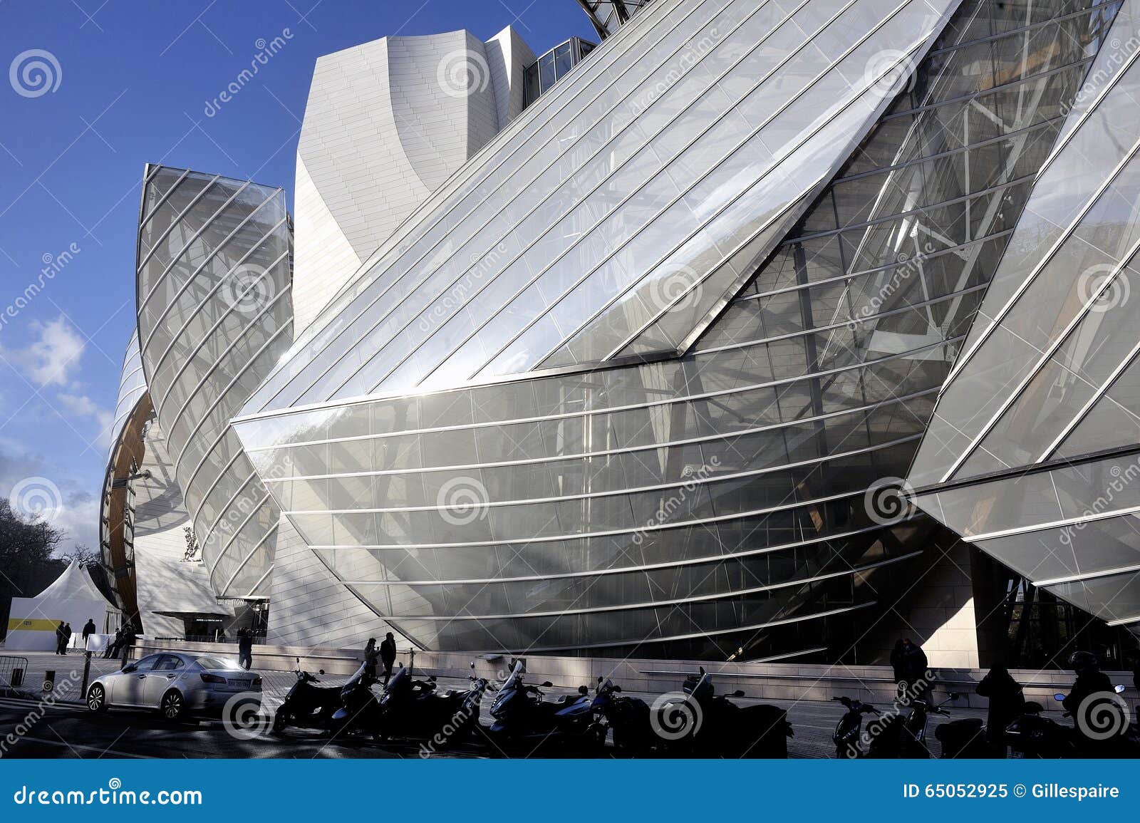 Museum Of Contemporary Art Of The Louis Vuitton Foundation Created By The  American Architect Frank Gehry, The Building Is Located Porte Maillot At  The Entrance Of The Bois De Boulogne. Stock Photo