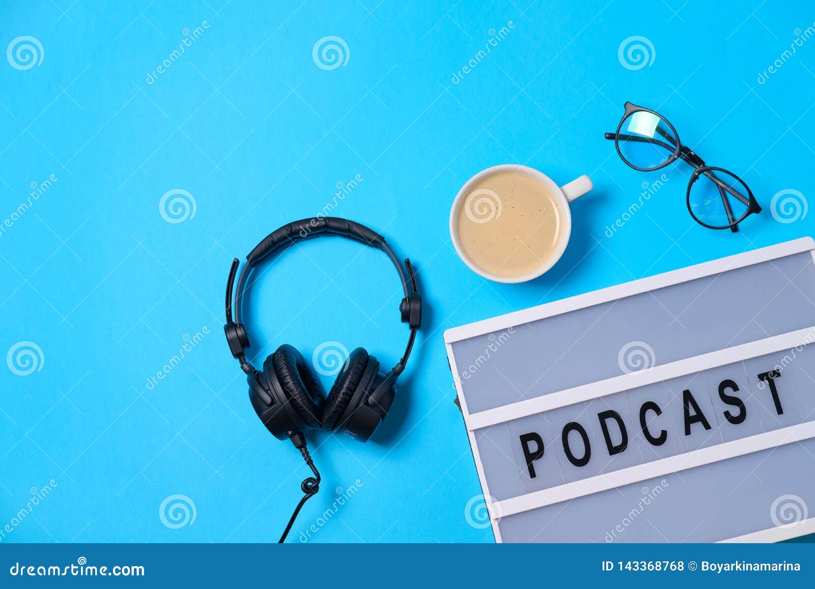 Music Background with Podcast Word on Lightbox, Headphones and Cup of  Coffee on Blue Table, Flat Lay. Top View, Flat Lay, Space Stock Photo -  Image of internet, education: 143368768