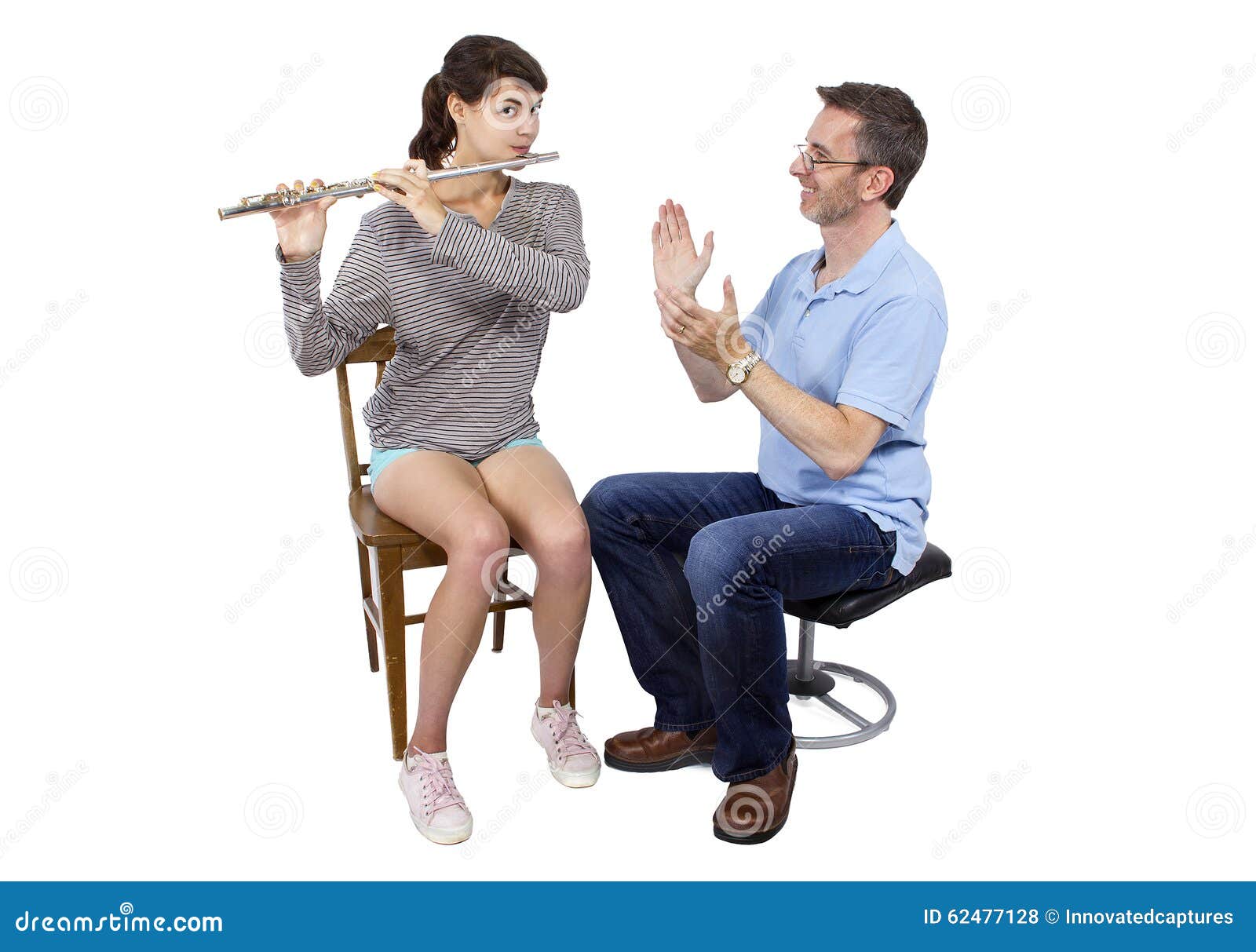 Music Instructor Teaching How To Play the Flute Stock Photo Image of