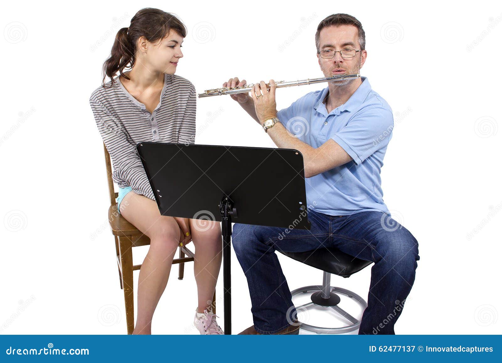 Music Instructor Teaching How To Play the Flute Stock Image Image of