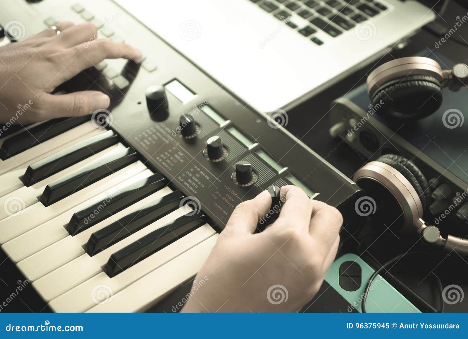 Music Keyboard Player is Adjusting Sound Synthesizer Stock Image