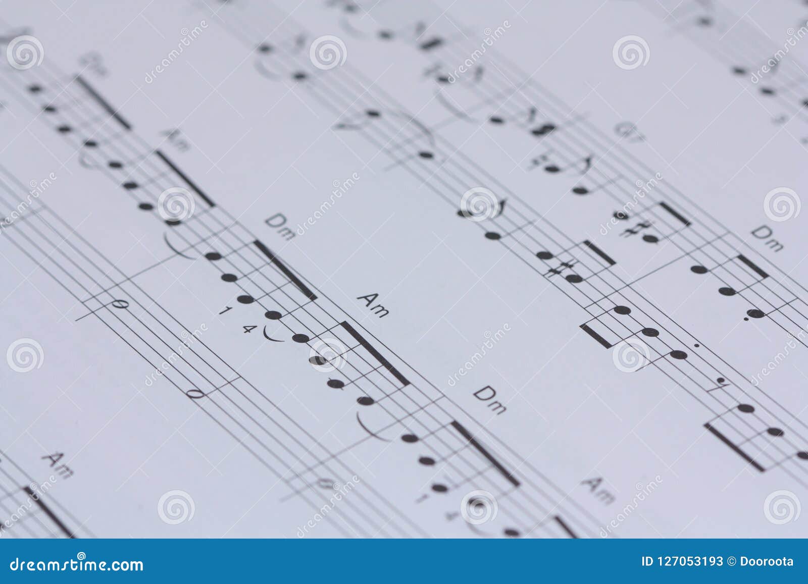 Music Notes On White Paper. Stock Image - Image of concert