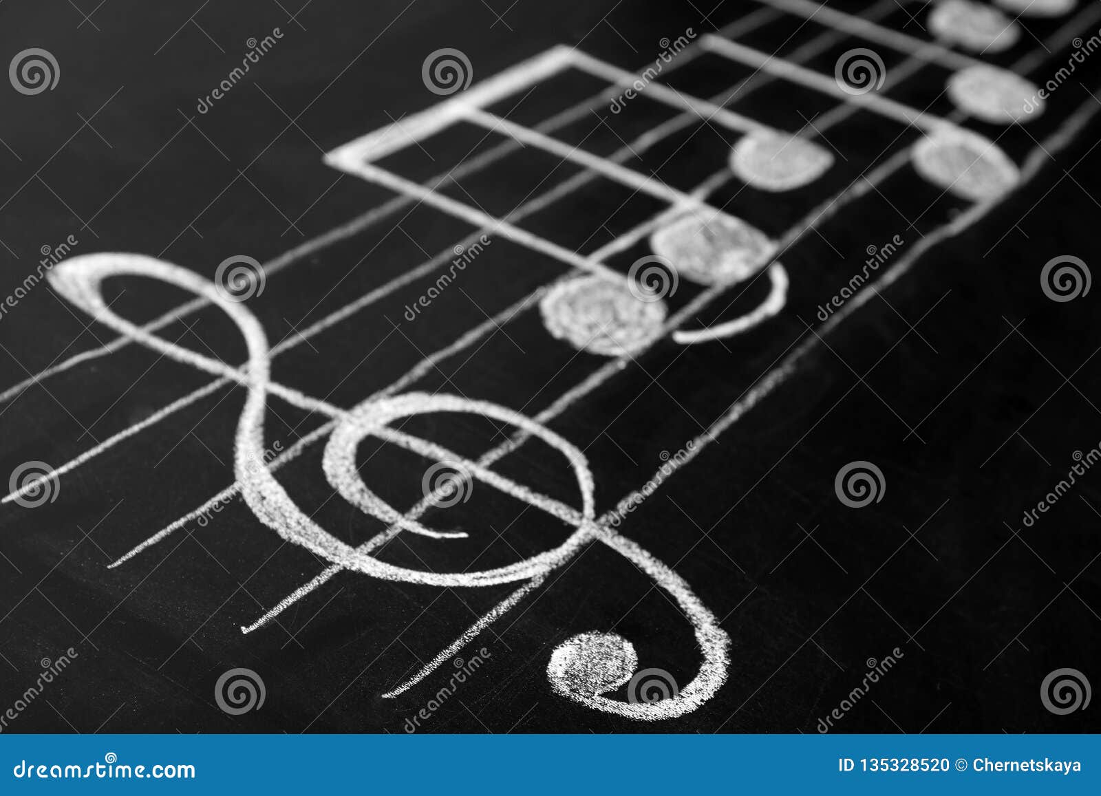 Music Scale with Treble Clef and Notes on Chalkboard Stock Photo