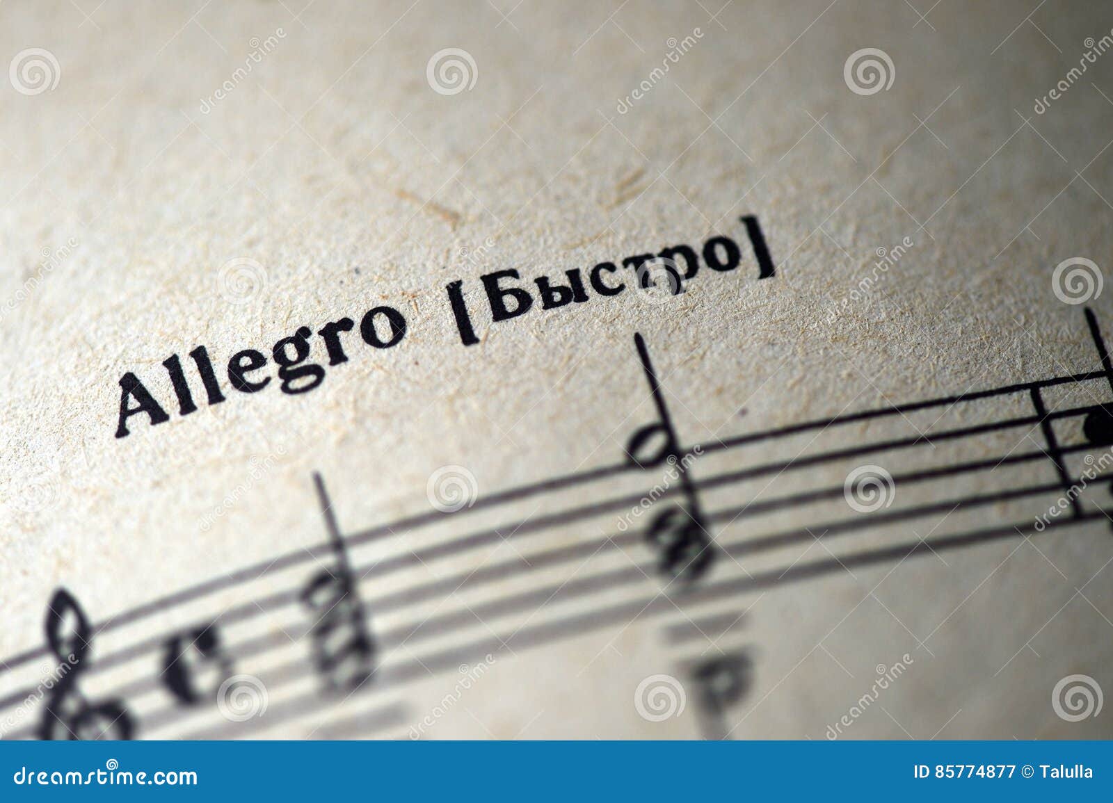 musical tempo `allegro` in a music notebook