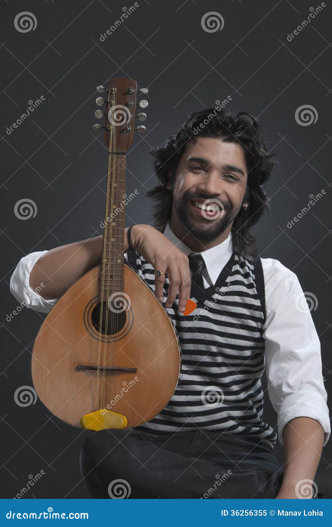 Musician Holding a Lute and Smiling Stock Image Image of sitting