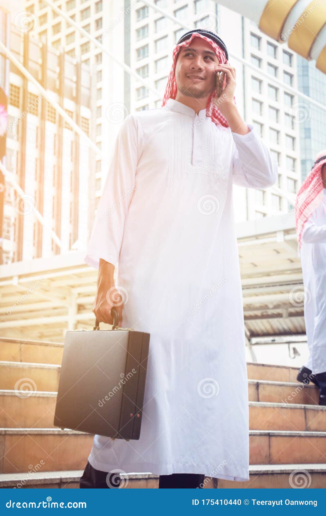 Muslim Arab Man Play Smart Phone and Talking Stock Photo - Image of ...