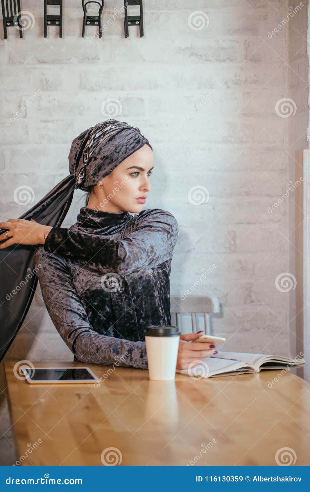 Muslim Women Holding Smartphonephone. Thinking of Good Memories. Stock ...