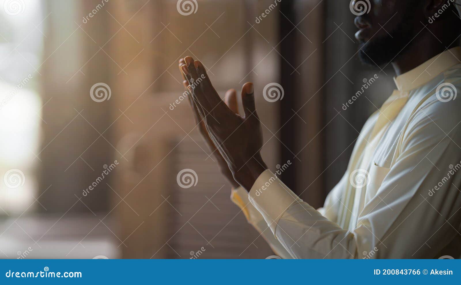 muslim man praying and worship dua ask allah for blessing during ramadan