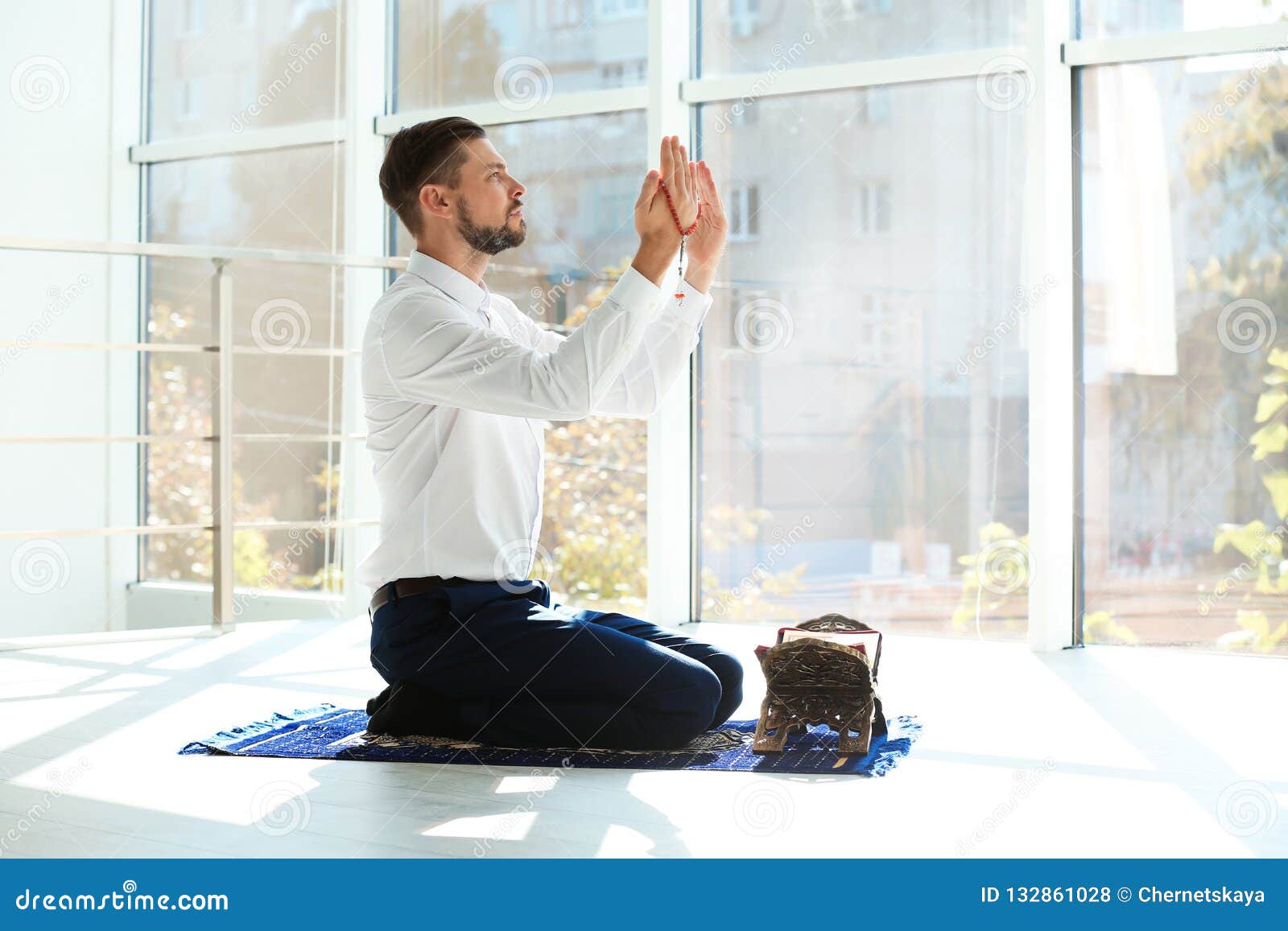 Muslim Man in Suit Praying on Rug Stock Photo - Image of caucasian ...