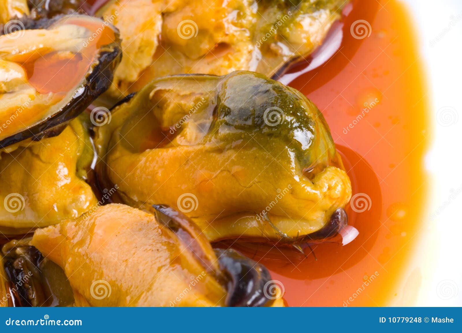 Mussels in red sauce stock photo. Image of mollusc, cuisine 10779248