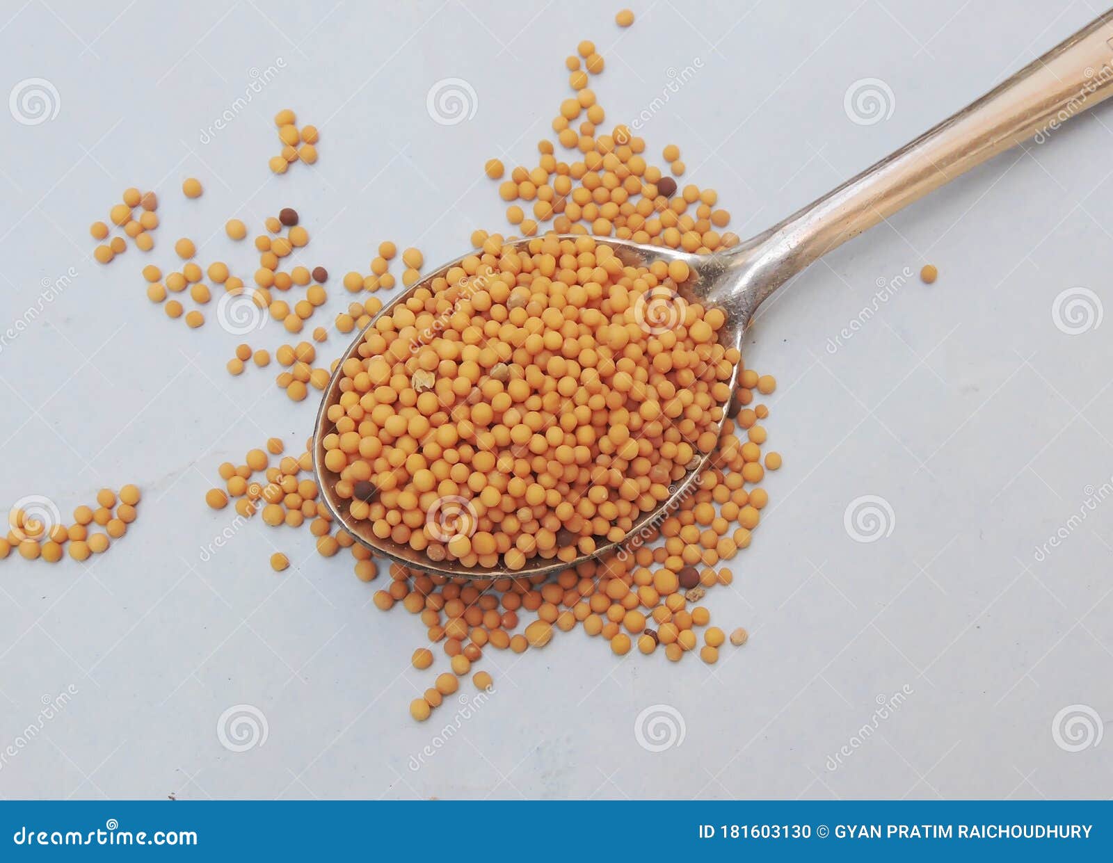 mustard seeds in  white background.