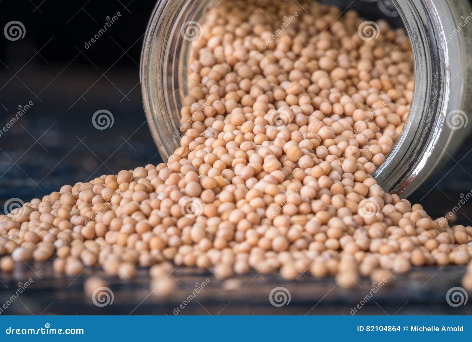 Yellow Mustard Seeds Spilled from a Jar Stock Photo Image of