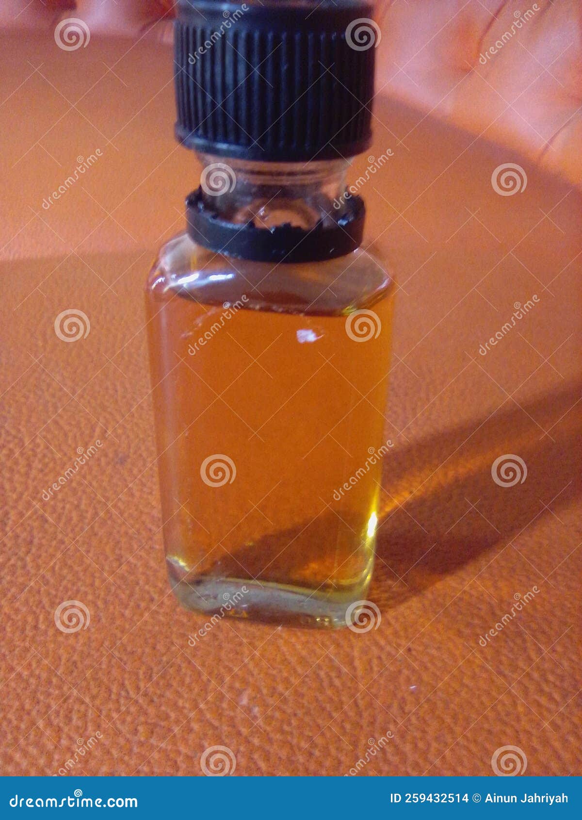 This is my rubbing oil stock photo. Image of lighting 259432514