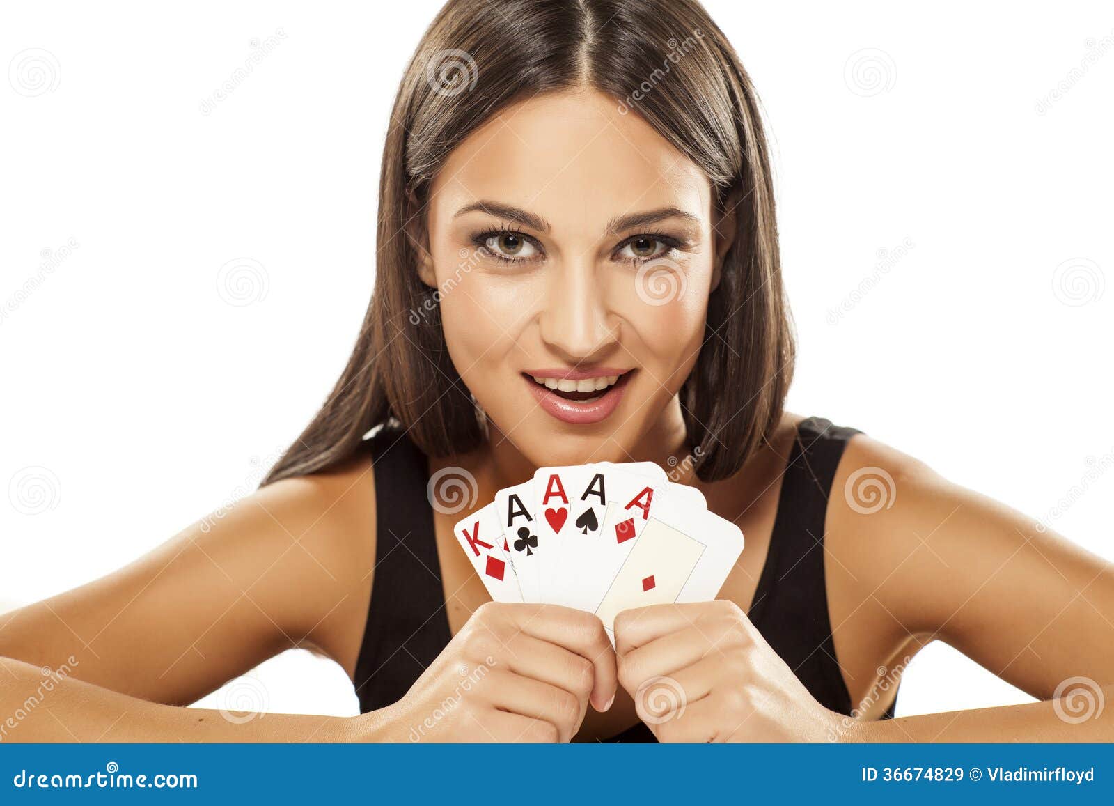 My win. Happy attractive girl holding the winning combination of poker cards