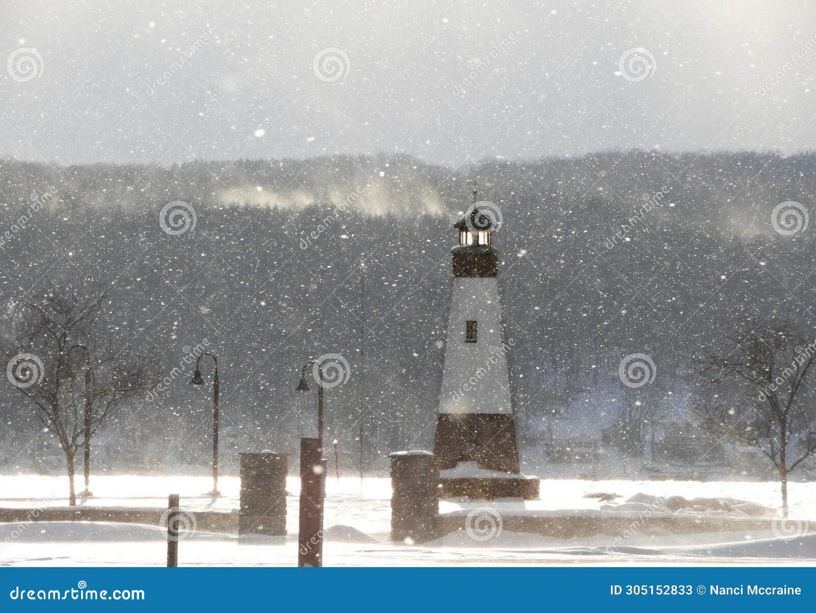fingerlakes lighthouse on cayuga lake during a winter snow squall