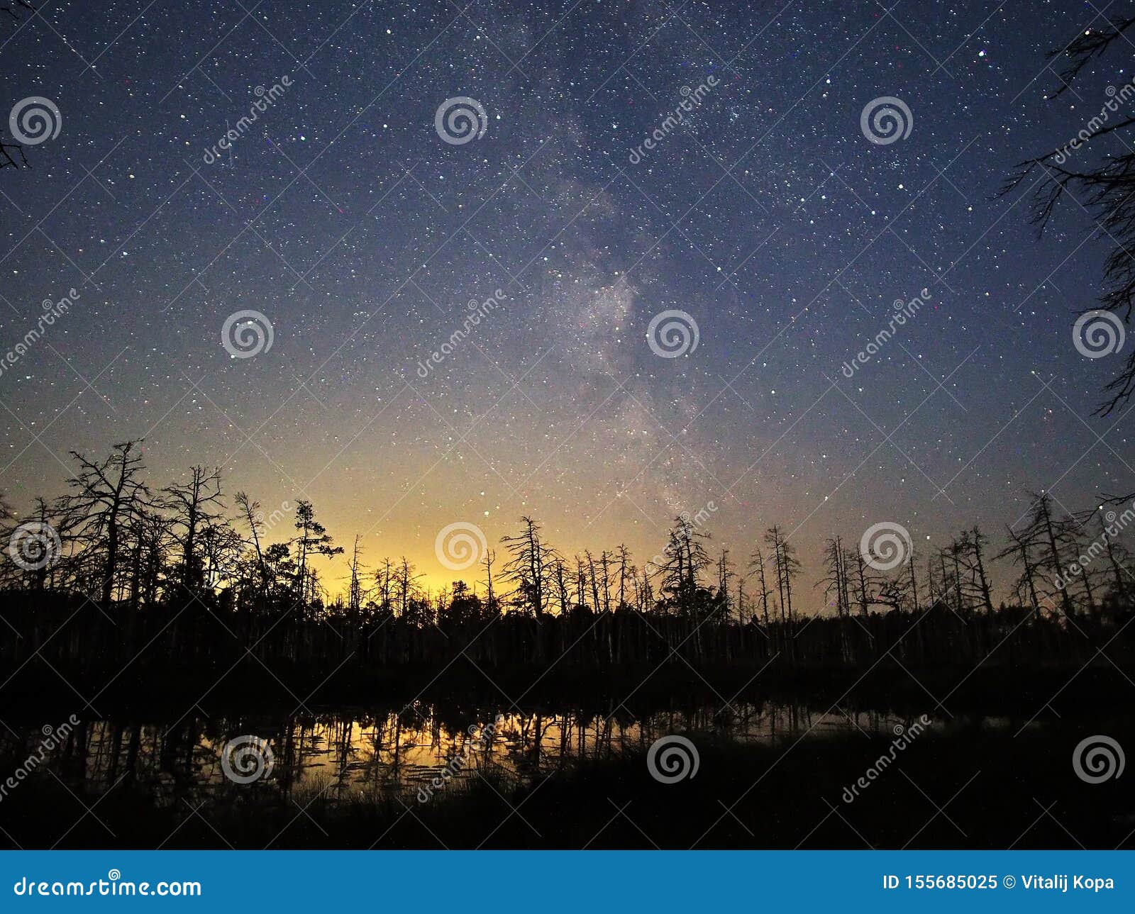milky way night sky stars observing over lake