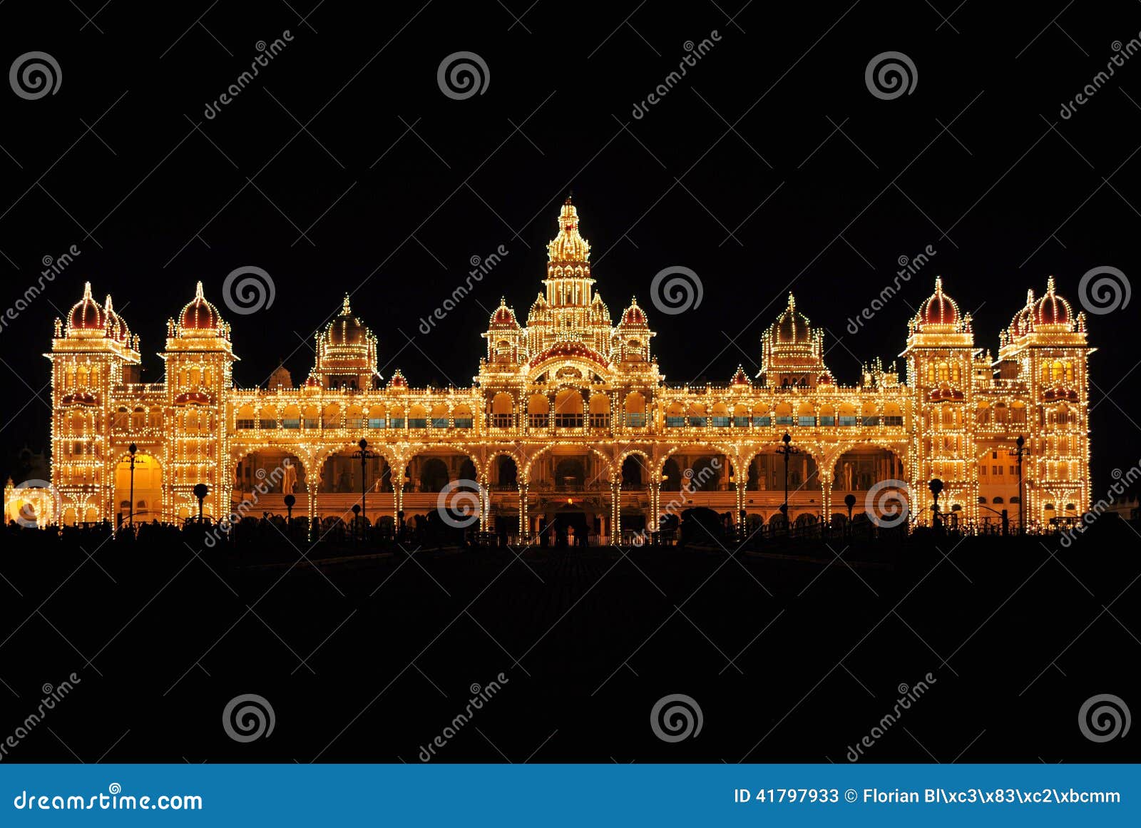 mysore palace in india illuminated at night