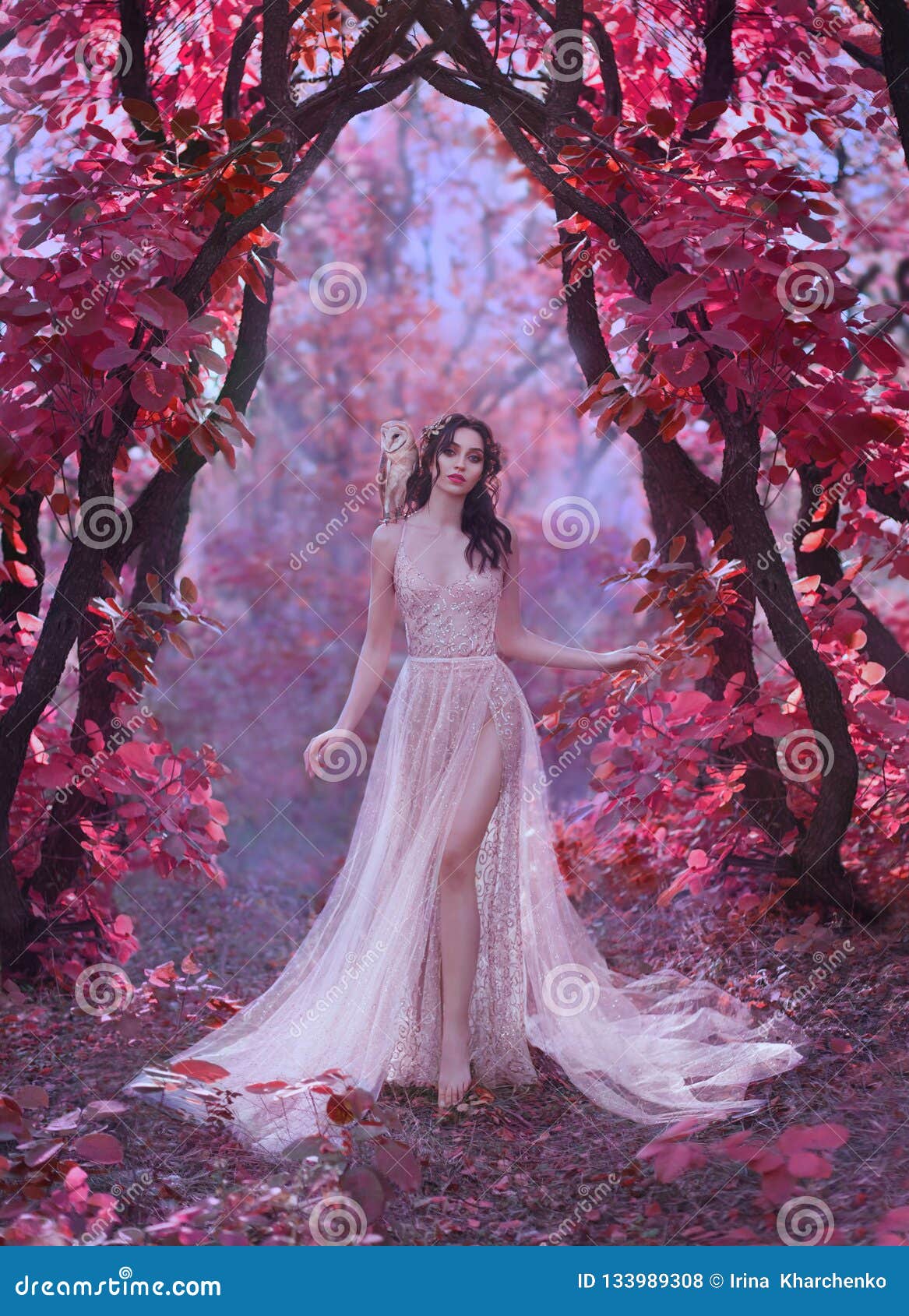 mysterious attractive lady in a long light luxury dress in a magical pink forest, gate to the fairy-tale world, cute