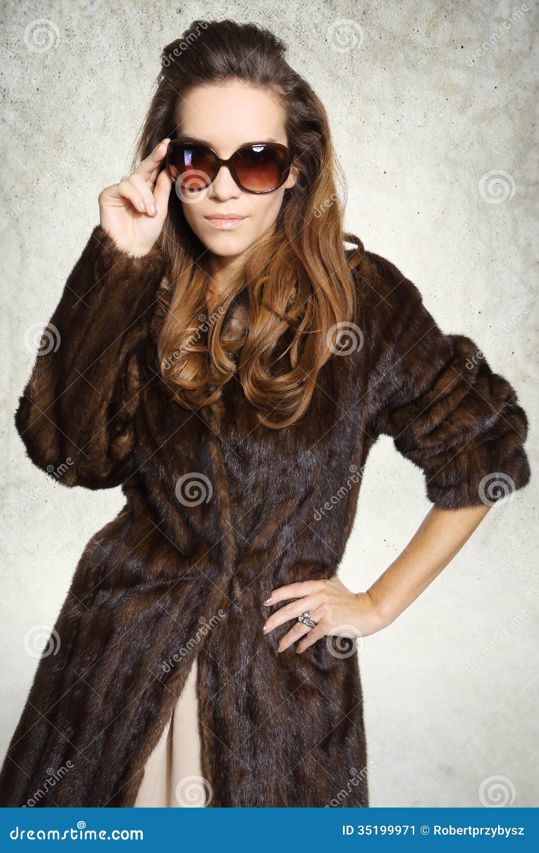 Mysterious Elegant Woman In A Fur Coat And Sunglasses 
